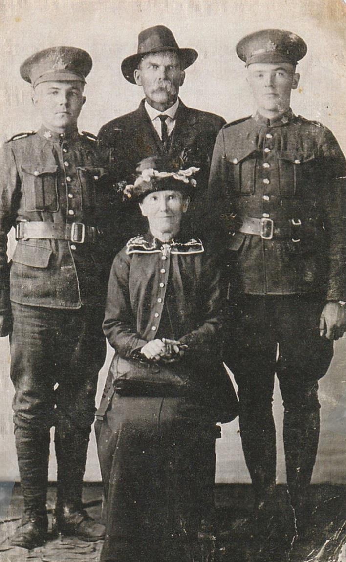 Alfred Hayes, Edward Passmore, Ernie Passmore and Catherine Passmore at Lafleche 1916. Grandma Catherine Hayes wrote on the back of the picture “My soldier boys”. 